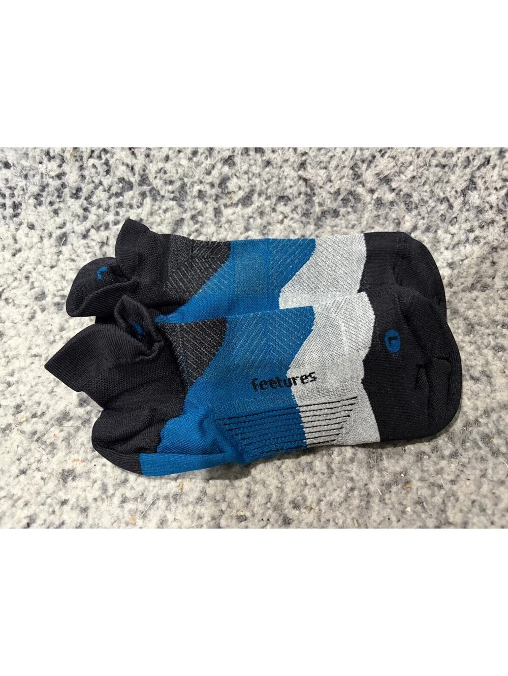 (1) Pair Feetures Elite Ultra Light Cushion No Show Tab Socks Black Sea Sz Large